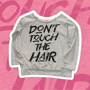 Gray crewneck Sweatshirt that says “Don’t touch the hair”. Size XS.